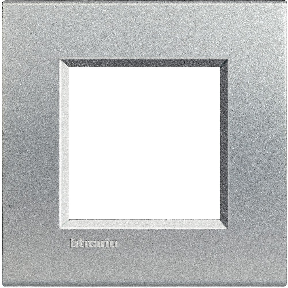 Living Light Placca quadra 2P Tech LNA4802TE metal switch plate in sleek silver finish for modern interiors.