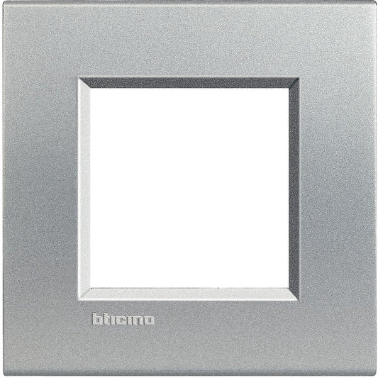 Living Light Placca quadra 2P Tech LNA4802TE metal switch plate in sleek silver finish for modern interiors.