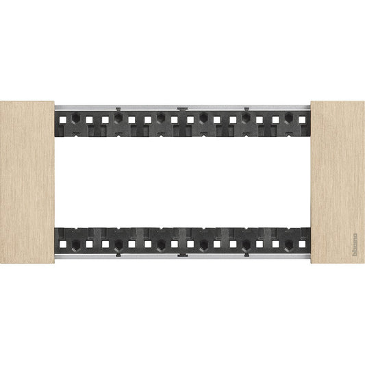 BTicino Living Now 6-moduli plate in gold, made of zama, dimensions 86mm x 192.5mm, for modern electrical installations.
