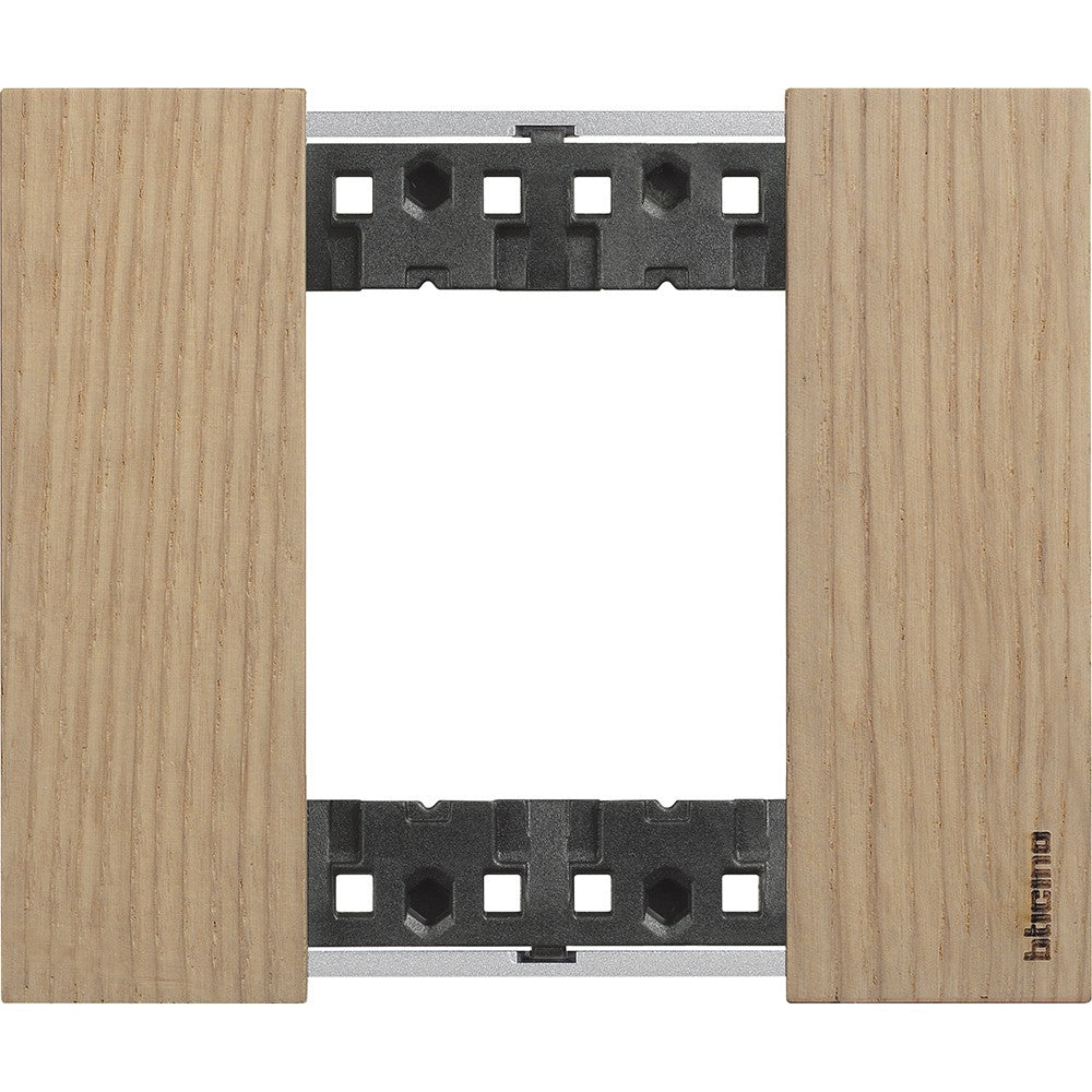 Living Now 2P Placca Rovere BTicino, bimaterica, 86mm height, 102.5mm width, elegant design for modern interiors.