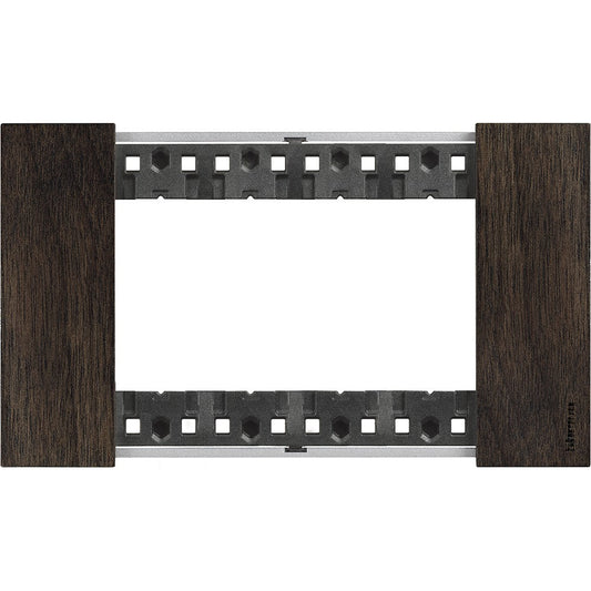 Living Now Placca 4P Noce by BTicino, 4-module device cover in walnut finish, plastic material, dimensions 86mm x 147.5mm.