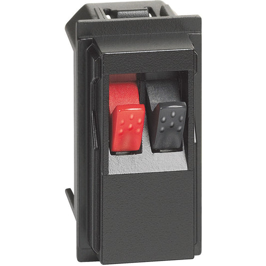 Bticino Living Now speaker connector for home cinema, black with red and black terminals, compact design.